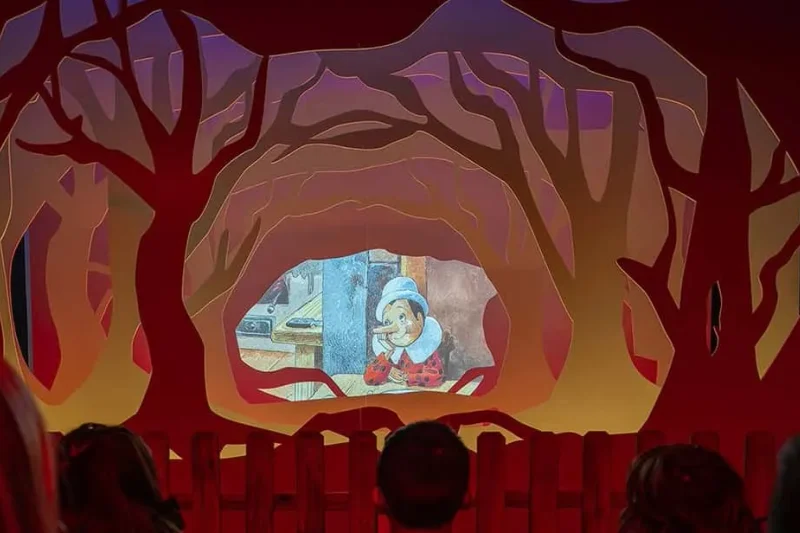 Illuminated storybook sets at the Pinocchio Museum Experience, a family attraction among the museums in Florence, Italy