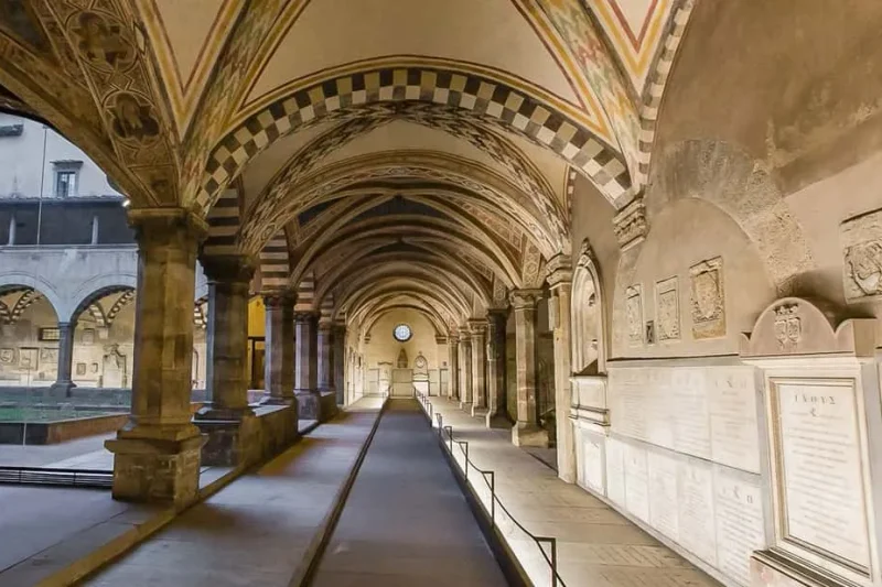 The frescoed arcaded cloister of Santa Maria Novella, among the museums in Florence, Italy